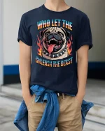 Who Let The Dog Unleash The Beast Funny Bulldog Graphic Tee - model wearing navy tee with hands in pockets