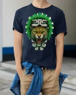Aztec Jaguar Warrior Graphic Tee With Powerful Tribal Art - model wearing navy tee with hands in pockets