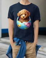 Cute Puppy In Easter Egg Graphic Tee With Adorable Art - model wearing navy tee with hands in pockets