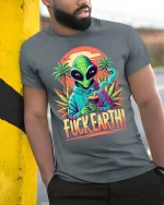 Alien Fuck Earth Graphic Tee With Retro Psychedelic Art - model wearing grey tee, leaning on column