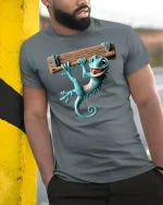 Funny Hanging Gecko Graphic Tee With Cute Cartoon Style - model wearing grey tee, leaning on column