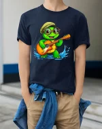 Cute Turtle Playing Guitar Graphic Tee With Happy Music Vibes - model wearing navy tee with hands in pockets