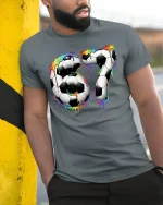 Colorful Soccer Number 67 Art T Shirt With Bold Sport Energy - model wearing grey tee, leaning on column