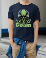 Cosmic Doom DJ Cthulhu Tee Psychedelic Monster Music Art - model wearing navy tee with hands in pockets