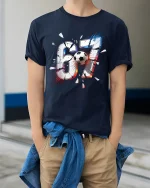 67 Soccer Power Graphic T Shirt Bold Goal Moment Sport Tee - model wearing navy tee with hands in pockets