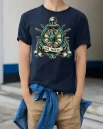 Vintage Pirate Ship Wheel Anchor Emblem Nautical Graphic T Shirt - model wearing navy tee with hands in pockets