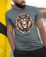 Majestic Crowned Lion King Graphic Tee With Royal Power Style - model wearing grey tee, leaning on column