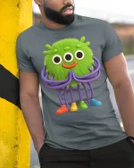 Cute Green Alien Monster Cartoon Art T Shirt Funny Graphic Tee - model wearing grey tee, leaning on column