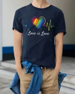 Love Is Love Rainbow Heart Pulse Graphic Tee Pride Message Tshirt - model wearing navy tee with hands in pockets