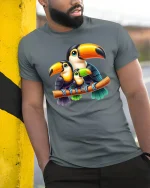 Cute Toucan Family Illustration Graphic Tee Tropical Bird Tshirt - model wearing grey tee, leaning on column