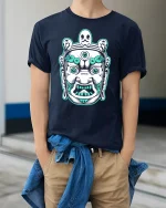 Mystic Guardian Face Graphic Tee With Bold Tribal Art Style - model wearing navy tee with hands in pockets