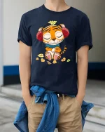 Cute Relaxed Tiger Cartoon Graphic T Shirt With Cozy Autumn Vibes - model wearing navy tee with hands in pockets