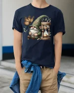 Whimsical Gnome with Butterfly and Hourglass Fantasy Graphic T Shirt - model wearing navy tee with hands in pockets