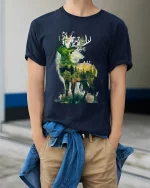 Majestic Forest Deer Silhouette Nature Graphic T Shirt Art - model wearing navy tee with hands in pockets