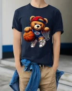 Cute Basketball Teddy Bear Graphic T Shirt Fun Sports Style - model wearing navy tee with hands in pockets