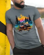 Off Road Adventure Jeep Graphic T Shirt Mountain Forest Art - model wearing grey tee, leaning on column