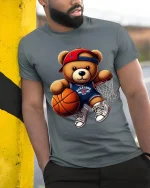 Cute Basketball Teddy Bear Graphic T Shirt Fun Sports Style - model wearing grey tee, leaning on column