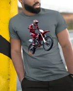 Motocross Dirt Bike Rider Graphic T Shirt Extreme Racing Action - model wearing grey tee, leaning on column