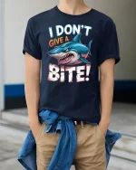 I Dont Give A Bite Shark Graphic T Shirt Funny Attitude Art - model wearing navy tee with hands in pockets
