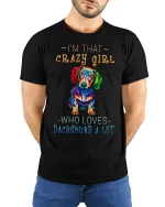 Im That Crazy Girl Dachshund Graphic T Shirt Colorful Dog Art - model wearing black tee with hands behind back