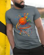 Color Splash Basketball Graphic T Shirt Dynamic Street Art Style - model wearing grey tee, leaning on column