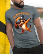 Dachstastic Dabbing Dachshund Graphic T Shirt Funny Dog Style - model wearing grey tee, leaning on column