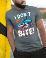 I Dont Give A Bite Shark Graphic T Shirt Funny Attitude Art - model wearing grey tee, leaning on column