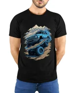 Off Road Mountain Adventure Truck Graphic Tee Shirt Design - model wearing black tee with hands behind back