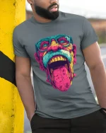 Trippy Wild Face Pop Art Graphic Tee With Bold Neon Energy - model wearing grey tee, leaning on column