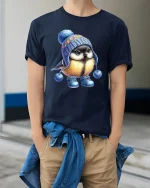 Cute Winter Bird Tee With Cozy Knit Hat Wholesome Art Style - model wearing navy tee with hands in pockets