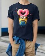 Funny Yellow Cartoon Tee Cute Character Holding Heart Donut Art - model wearing navy tee with hands in pockets