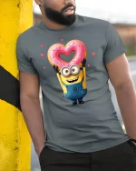 Funny Yellow Cartoon Tee Cute Character Holding Heart Donut Art - model wearing grey tee, leaning on column