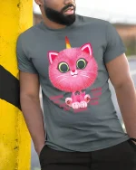 Cute Pink Caticorn Cartoon Tee Fun Fantasy Graphic Style - model wearing grey tee, leaning on column