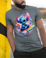 Cute Blue Alien Surf Art Tee Colorful Fantasy Graphic Style - model wearing grey tee, leaning on column