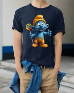 Cute Blue Cartoon Character With Lollipop Graphic T Shirt Fun Tee - model wearing navy tee with hands in pockets