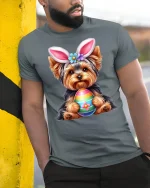 Cute Bunny Puppy Holding Colorful Egg Graphic T Shirt Sweet Art Tee - model wearing grey tee, leaning on column