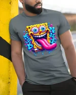 Crazy Sponge Cartoon Graphic Tshirt Trippy Funny Art Tee - model wearing grey tee, leaning on column