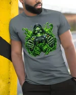 Toxic Gamer Skull Graphic Tshirt Neon Horror Gaming Art Tee - model wearing grey tee, leaning on column