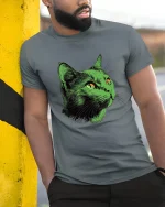 Neon Green Cat Face Graphic T Shirt Art - model wearing grey tee, leaning on column