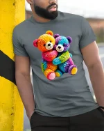Cute Rainbow Teddy Bears Hugging Graphic T Shirt - model wearing grey tee, leaning on column