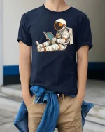 Reading Astronaut Space Graphic T-Shirt - model wearing navy tee with hands in pockets