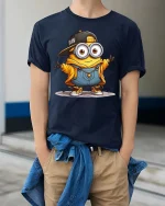 Cool Cartoon Minion Style T-Shirt Funny Yellow Character Tee - model wearing navy tee with hands in pockets