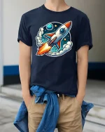 Retro Rocket T-Shirt Space Rocket Launch Cartoon Tee Gift - model wearing navy tee with hands in pockets