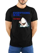 Funny Shark Everything Is OK Graphic T-Shirt Humor Ocean Tee - model wearing black tee with hands behind back