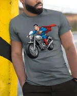 Superhero Biker Graphic T-Shirt Cool Comic Motorcycle Rider Tee - model wearing grey tee, leaning on column