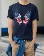 Patriotic American Flag Angel Wings Graphic T-Shirt - model wearing navy tee with hands in pockets