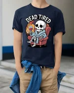 Dead Tired Funny Skeleton Relaxing Graphic T-Shirt - model wearing navy tee with hands in pockets