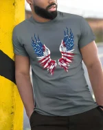 Patriotic American Flag Angel Wings Graphic T-Shirt - model wearing grey tee, leaning on column