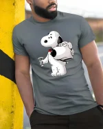 Funny Dog Holding Dog Head T-Shirt Cartoon Humor Tee - model wearing grey tee, leaning on column