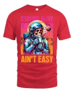 Staying Alive Ain’t Easy Funny Astronaut Skull T-Shirt - red t-shirt on white background